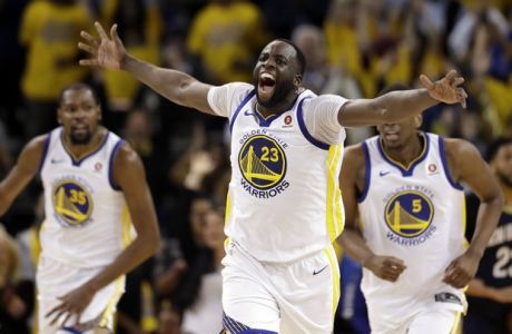 Golden State Warriors' Draymond Green celebrates after a basket against the New Orleans Pelicans during the first half in Game 1 of an NBA basketball second-round playoff series Saturday, April 28, 2018, in Oakland, Calif. (AP Photo/Marcio Jose Sanchez)