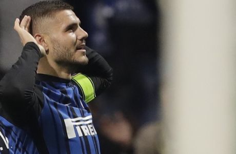 Inter's Mauro Icardi celebrates after scoring second goal for his side during an Italian Serie A soccer match between Inter Milan and Sampdoria, at the San Siro stadium in Milan, Italy, Tuesday, Oct. 24, 2017. (AP Photo/Luca Bruno)