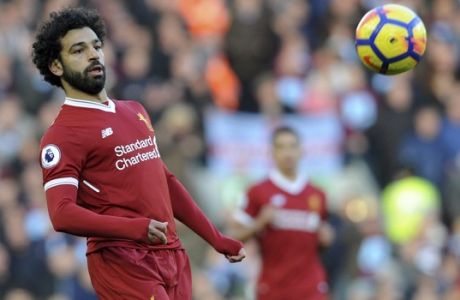 Liverpool's Mohamed Salah during the English Premier League soccer match between Liverpool and West Ham United at Anfield in Liverpool, England, Saturday, Feb. 24, 2018. (AP Photo/Rui Vieira)