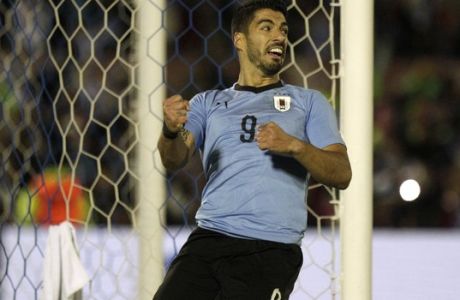 Uruguay's Luis Suarez celebrates his team's goal during a friendly soccer match against Uzbekistan in preparation for the 2018 Russia World Cup in Montevideo, Uruguay, Thursday, June 7, 2018. (AP Photo/Matilde Campodonico)