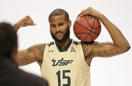 South Florida's Jaleel Cousins (15) poses for a photo during the American Athletic Conference NCAA college basketball media day, Tuesday, Oct. 27, 2015, in Orlando, Fla. (AP Photo/John Raoux)