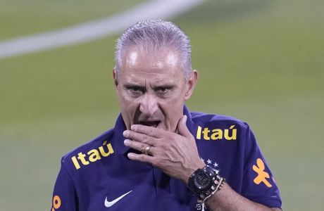 Brazil's head coach Tite attends a training session at the Grand Hamad stadium in Doha, Qatar, Sunday, Nov. 20, 2022. Brazil will play their first match in the World Cup against Serbia on Nov. 24. (AP Photo/Andre Penner)