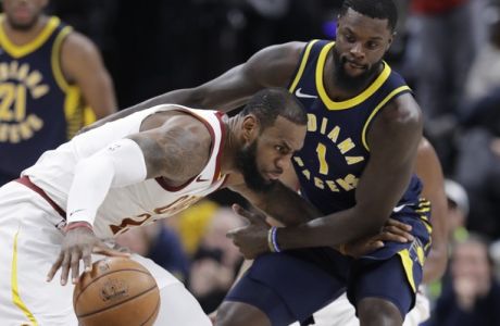 Cleveland Cavaliers' LeBron James (23) is defended by Indiana Pacers' Lance Stephenson during the second half of an NBA basketball game, Friday, Jan. 12, 2018, in Indianapolis. (AP Photo/Darron Cummings)