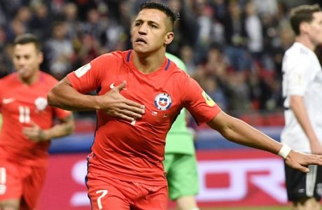 Chile's Alexis Sanchez celebrates after scoring the opening goal during the Confederations Cup, Group B soccer match between Germany and Chile, at the Kazan Arena, Russia, Thursday, June 22, 2017. (AP Photo/Martin Meissner)