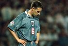 England's Gareth Southgate bows his head after missing from the spot during a penalty shootout in the European Soccer Championships semi-final match against Germany at London's Wembley Stadium Wednesday June 26, 1996. Germany won 6-5 on penalties.  (AP Photo/Lynne Sladky)