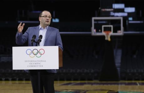 International Olympic Committee Evaluation Commission Chair Patrick Baumann speaks during a news conference at Staples Center, Friday, May 12, 2017, in Los Angeles. The IOC officials wrapped up four days of evaluating Los Angeles' bid for the 2024 Games before heading to Paris to check the only other candidate. (AP Photo/Jae C. Hong)