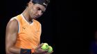 Spain's Rafael Nadal prepares to serve to Serbia's Novak Djokovic during the men's singles final at the Australian Open tennis championships in Melbourne, Australia, Sunday, Jan. 27, 2019. (AP Photo/Kin Cheung)