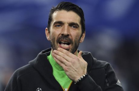 Juventus goalkeeper Gianluigi Buffon stands on the pitch before the Champions League round of 16, first leg, soccer match between FC Porto and Juventus at the Dragao stadium in Porto, Portugal, Wednesday, Feb. 22, 2017. (AP Photo/Paulo Duarte)