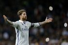 Real Madrid's Sergio Ramos celebrates after scoring his side's second goal against Real Betis during a Spanish La Liga soccer match between Real Madrid and Real Betis at the Santiago Bernabeu stadium in Madrid, Sunday, March 12, 2017. Ramos scored the winning goal in Real Madrid's 2-1 victory. (AP Photo/Francisco Seco)