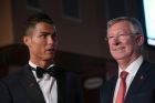 Sir Alex Ferguson, right, and Cristiano Ronaldo pose for photographers upon arrival at the world premiere of the film 'Ronaldo, in London, Monday, Nov. 9, 2015. (Photo by Joel Ryan/Invision/AP)