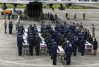 Members of the Colombian Air Force get ready to load onto a plane in Rionegro, Antioquia department, Colombia, on December 2, 2016 the coffins with the remains of the members of the Brazilian football team Chapecoense Real who died in a plane crash in the Colombian mountains earlier this week, to be repatriated to Brazil.
The bodies of the 71 victims killed in the crash that wiped out the Brazilian team began arriving home Friday, as mourners prepared a massive funeral. The other victims -- 64 Brazilians, five Bolivians and a Venezuelan -- are being flown home on a series of flights throughout the day.
 / AFP PHOTO / Luis ACOSTA
