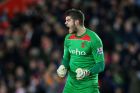 SOUTHAMPTON, ENGLAND - MARCH 03:  Goalkeeper Fraser Forster of Southampton celebrates as his team take a 1-0 lead  during the Barclays Premier League match between Southampton and Crystal Palace at St Mary's Stadium on March 3, 2015 in Southampton, England.  (Photo by Paul Gilham/Getty Images)
