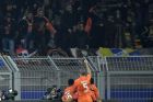 APOEL Nicosia players celebrated the goal of they teammate Mickael Pote, who score against Dortmund during the Champions League group H soccer match between Borussia Dortmund and APOEL Nicosia in Dortmund, Germany, Wednesday, Nov. 1, 2017. (AP Photo/Martin Meissner)