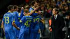 Roma's French coach Rudi Garcia (R) looks on as BATE's players celebrate a goal during the UEFA Champions League group E football match between FC BATE Borisov and AS Roma at the Borisov-Arena in Borisov outside Minsk on September 29, 2015. AFP PHOTO / MAXIM MALINOVSKY        (Photo credit should read MAXIM MALINOVSKY/AFP/Getty Images)