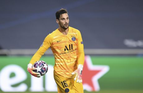 PSG's goalkeeper Sergio Rico holds the ball during the Champions League semifinal soccer match between RB Leipzig and Paris Saint-Germain at the Luz stadium in Lisbon, Portugal, Tuesday, Aug. 18, 2020. (David Ramos/Pool Photo via AP)