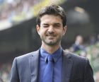 Inter Milan coach Andrea Stramaccioni winks his eye prior to the start of the Serie A soccer match between Inter Milan and Genoa at the San Siro stadium in Milan, Italy, Sunday, April 1, 2012. (AP Photo/Antonio Calanni)