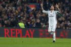 Real Madrid's Sergio Ramos celebrates after scoring his side's first goal during the Spanish La Liga soccer match between FC Barcelona and Real Madrid at the Camp Nou in Barcelona, Spain, Saturday, Dec. 3, 2016. Ramos scored the equalizer goal and the match ended in a 1-1 draw. (AP Photo/Francisco Seco)
