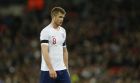 England's Eric Dier reacts to teammates during the friendly soccer match between England and Italy at Wembley stadium London, Tuesday, March, 27, 2018. (AP Photo/Alastair Grant)