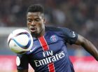 FILE - In this Aug.16, 2015 file photo, Paris Saint Germain's Serge Aurier watches the ball during the French League one soccer match between Paris Saint Germain and Ajaccio Gazelec, at the Parc des Princes stadium in Paris. Paris Saint-Germain defender Aurier has been sentenced to two months in prison for assaulting a police officer. The Ivory Coast player was arrested near the Champs-Elysees in May following an argument with police after a night out in Paris. (AP Photo/Jacques Brinon, File)