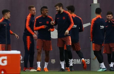 From left to right: FC Barcelona's Coutinho, Marc-Andre ter Stegen, Paulinho, Gerard Pique, Andre Gomes, Luis Suarez and Lionel Messi take part in a training session at the Sports Center FC Barcelona Joan Gamper in Sant Joan Despi, Monday, April 16, 2018. Celta Vigo will play against FC Barcelona in a Spanish La Liga soccer match on Tuesday. (AP Photo/Manu Fernandez)