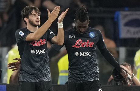 Napoli's Khvicha Kvaratskhelia, left, celebrates after scoring his side's second goal with Victor Osimhen during a Serie A soccer match between Lazio and Napoli at Rome's Olympic Stadium, Saturday, Sept. 3, 2022. (AP Photo/Andrew Medichini)