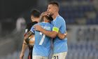 Lazio's Sergej Milinkovic-Savic, right, celebrates with his teammates after he scored his side's first goalduring an Europa League group F soccer match between Lazio and Midtjylland, at Rome's Olympic Stadium, Thursday, Oct. 27, 2022. (AP Photo/Alessandra Tarantino)