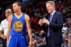 PHILADELPHIA, PA - FEBRUARY 9: Stephen Curry #30 of the Golden State Warriors gets direction from Head Coach Steve Kerr against the Philadelphia 76ers at Wells Fargo Center on February 9, 2015 in Philadelphia, Pennsylvania NOTE TO USER: User expressly acknowledges and agrees that, by downloading and/or using this Photograph, user is consenting to the terms and conditions of the Getty Images License Agreement. Mandatory Copyright Notice: Copyright 2015 NBAE (Photo by Jesse D. Garrabrant/NBAE via Getty Images)