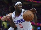 Los Angeles Clippers forward Montrezl Harrell rebounds in the second half of an NBA basketball game against the Cleveland Cavaliers, Friday, March 22, 2019, in Cleveland. The Clippers won 110-108. (AP Photo/David Dermer)