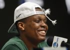 Michigan State guard Cassius Winston (5) smiles while answering questions during a news conference after beating Duke 68-67 of a NCAA men's East Regional final college basketball game in Washington, Sunday, March 31, 2019. (AP Photo/ Mark Tenally)