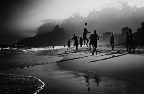 RIO DE JANEIRO, BRAZIL - JUNE 09: (EDITOR'S NOTE: Image was processed using digital filters.)  Locals play Football on Ipanema Beach on June 9, 2014 in Rio de Janeiro, Brazil. Photo by Ryan Pierse - FIFA/FIFA via Getty Images)