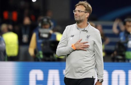 Liverpool coach Jurgen Klopp gestures at the end of the Champions League Final soccer match between Real Madrid and Liverpool at the Olimpiyskiy Stadium in Kiev, Ukraine, Saturday, May 26, 2018. Real Madrid won 3-1. (AP Photo/Pavel Golovkin)