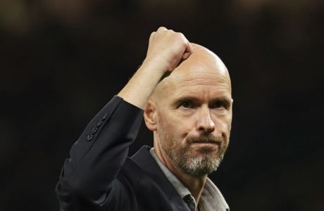 Manchester United's head coach Erik ten Hag celebrates at the end of the English Premier League soccer match between Manchester United and Liverpool at Old Trafford stadium, in Manchester, England, Monday, Aug 22, 2022. (AP Photo/Dave Thompson)