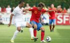 Sergio Canales of Spain, right, and England's John Bostock in action during the UEFA European Under-19 Championship semi-finals, Tuesday, July 27, 2010 in Saint Lo, northwestern France. (AP Photo/David Vincent)