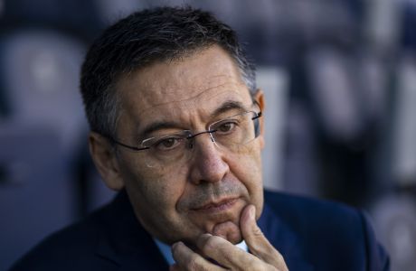 FILE - In this Nov. 8, 2019, file photo, President of FC Barcelona Josep Bartomeu pauses during and interview with the Associated Press at the Camp Nou stadium in Barcelona, Spain. Spanish police entered Barcelona's stadium on Monday March 1, 2021 and detained some people in a search and seize operation related to an investigation into club officials. The operation was related to last year's "Barçagate," in which club officials were accused of launching a smear campaign against current and former players who were critical of the club and then-president Josep Maria Bartomeu. (AP Photo/Emilio Morenatti, File)