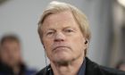 German soccer legend Oliver Kahn waits for the start of the Champions League quarter final second leg soccer match between Bayern Munich and Manchester City, at the Allianz Arena stadium in Munich, Germany, Wednesday, April 19, 2023. (AP Photo/Matthias Schrader)