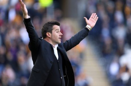 Hull City manager Marco Silva reacts on the touchline, during the English Premier League soccer match between Hull City and West Ham United, at the KCOM Stadium, in Hull, England, Saturday April 1, 2017.  (Richard Sellers/PA via AP)