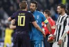 Juventus goalkeeper Gianluigi Buffon greets Tottenham's Harry Kane, left, as Juventus' Mattia de Sciglio looks at them, at the end of the Champions League, round of 16, first-leg soccer match between Juventus and Tottenham Hotspurs, at the Allianz Stadium in Turin, Italy, Tuesday, Feb. 13, 2018. The match need in a 2-2 draw. (AP Photo/Antonio Calanni)