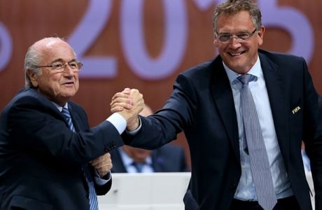 ZURICH, SWITZERLAND - MAY 29:  FIFA Secretary General Jerome Valcke (R) shakes hands with FIFA President Joseph S. Blatter during the 65th FIFA Congress at the Hallenstadion on May 29, 2015 in Zurich, Switzerland.  (Photo by Alexander Hassenstein - FIFA/FIFA via Getty Images)