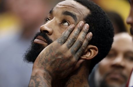 Cleveland Cavaliers' JR Smith looks up during a break in the second half of Game 6 of a first-round NBA basketball playoff series against the Indiana Pacers, Friday, April 27, 2018, in Indianapolis. (AP Photo/Darron Cummings)
