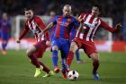 Barcelona's Javier Mascherano, center, fights for the ball with Atletico's Lucas Hernandez and Stefan Savic, right, during the the Copa del Rey semifinal second leg soccer match between FC Barcelona and Atletico Madrid at the Camp Nou stadium in Barcelona, Spain, Tuesday Feb. 7, 2017. (AP Photo/Manu Fernandez)