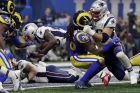 New England Patriots' Sony Michel dives for a touchdown during the second half of the NFL Super Bowl 53 football game against the Los Angeles Rams, Sunday, Feb. 3, 2019, in Atlanta. (AP Photo/Jeff Roberson)
