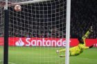 Ajax goalkeeper Andre Onana fails to save the ball as Real forward Karim Benzema scores his side's opening goal during the first leg, round of sixteen, Champions League soccer match between Ajax and Real Madrid at the Johan Cruyff ArenA in Amsterdam, Netherlands, Wednesday Feb. 13, 2019. (AP Photo/Peter Dejong)