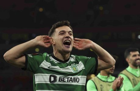 Sporting's Pedro Goncalves celebrates after the penalty shootout during the Europa League round of 16, second leg, soccer match between Arsenal and Sporting CP at the Emirates stadium in London, Thursday, March 16, 2023. (AP Photo/Ian Walton)