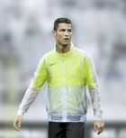 PARIS, FRANCE - OCTOBER 11: Cristiano Ronaldo of Portugal warms up before the international friendly match between France and Portugal at Stade de France on October 11, 2014 in Saint-Denis near Paris, France. (Photo by Jean Catuffe/Getty Images)