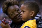 Shaquille O'Neal's mother, Lucille Harrison, holds the Lakers star's two-year-old son Shareef on the sidelines during Game 2 of the NBA Western Conference Semifinal game between the San Antonio Spurs and Los Angeles Lakers in Los Angeles, Tuesday, May 7, 2002. (AP Photo/Mark J. Terrill)