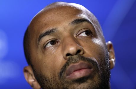 Monaco's coach Thierry Henry attends a press conference at Wanda Metropolitano stadium in Madrid, Spain, Tuesday, Nov. 27, 2018. Atletico will play Monaco Wednesday in a Group A Champions League soccer match. (AP Photo/Manu Fernandez)