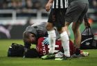 Liverpool's Mohamed Salah receives treatment after an injury during a Premier League match against Newcastle United at St James' Park, Newcastle, England, Saturday May 4, 2019. (Owen Humphreys/PA via AP)