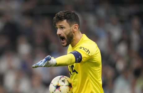 Tottenham's goalkeeper Hugo Lloris gestures during the Champions League Group D soccer match between Marseille and Tottenham Hotspur at the Stade Velodrome in Marseille, France, Tuesday, Nov. 1, 2022. (AP Photo/Daniel Cole)