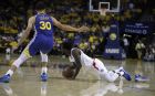 Los Angeles Clippers' Patrick Beverley, right, loses his shoe while driving the ball against Golden State Warriors' Stephen Curry (30) in the second half in Game 5 of a first-round NBA basketball playoff series, Wednesday, April 24, 2019, in Oakland, Calif. (AP Photo/Ben Margot)