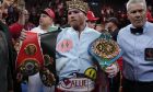 Canelo Alvarez celebrates after defeating Gennady Golovkin in their super middleweight title boxing match, Saturday, Sept. 17, 2022, in Las Vegas. (AP Photo/John Locher)